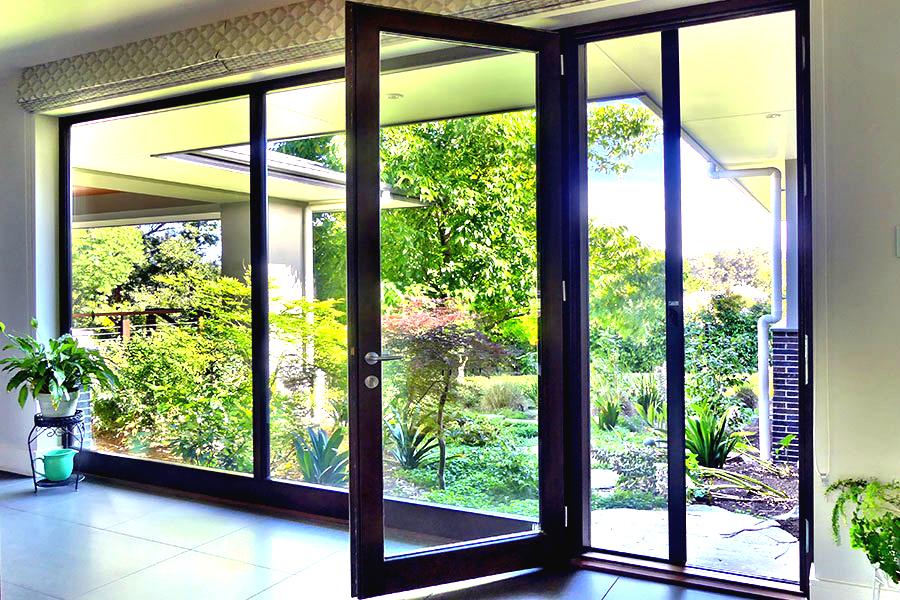 Hinged aluminium glass door